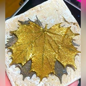 This one of a kind vintage geo tone Leaf pin.
